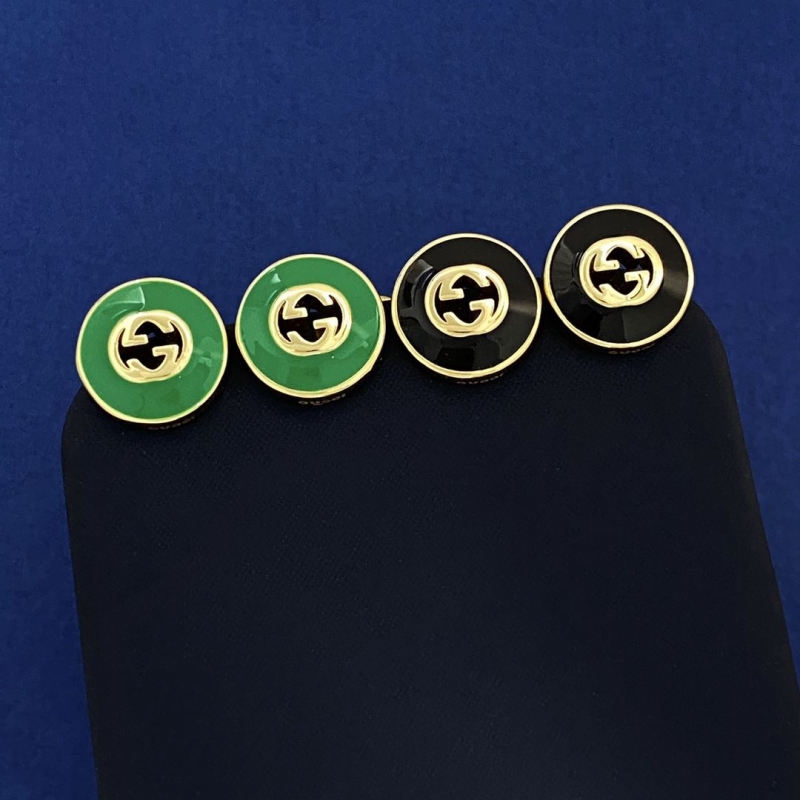 G*u*i earrings